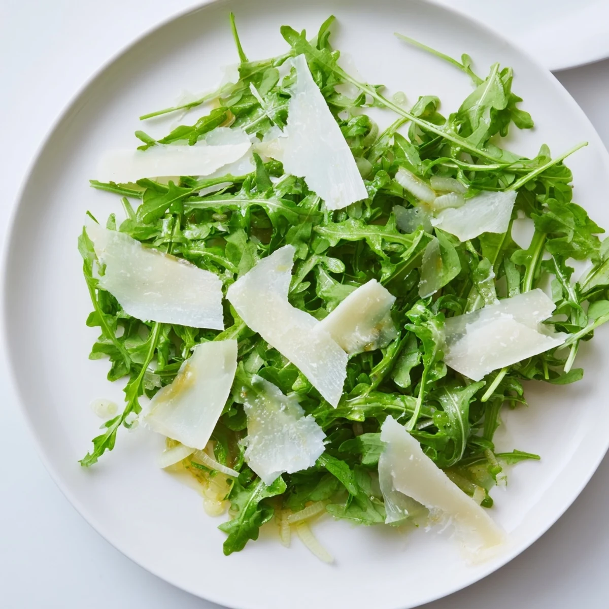 Imagine the zesty arugula salad with lemon dressing: a vibrant Italian garden on your plate.