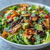 Delicious grilled corn and black bean taco salad, perfect for a summer meal.