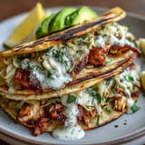 Flavorful shredded chicken cabbage tacos, perfect for easy weeknight dinners.