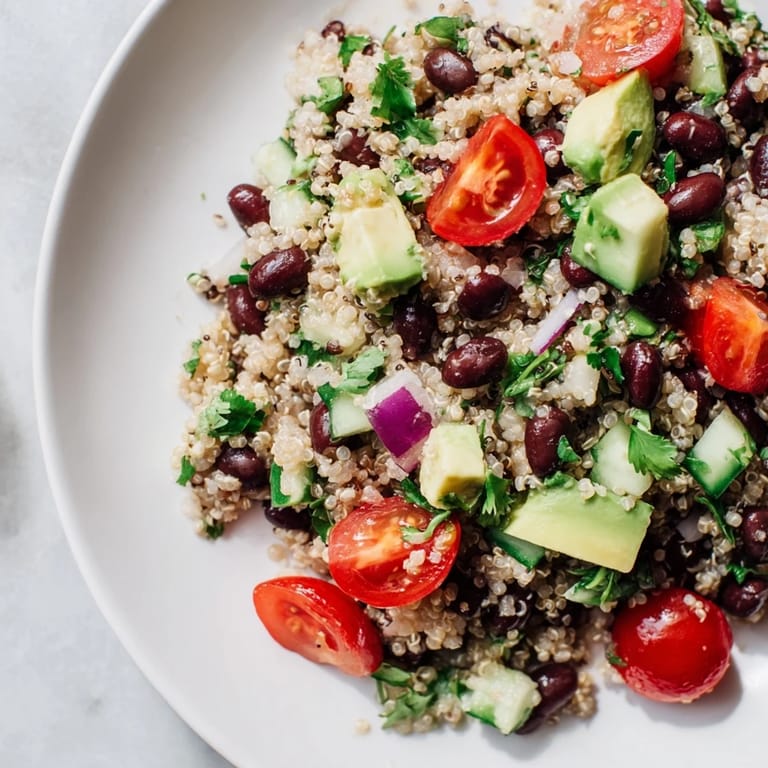 Chilled quinoa black bean salad, a refreshing mix of textures, perfect for a light vegetarian meal.